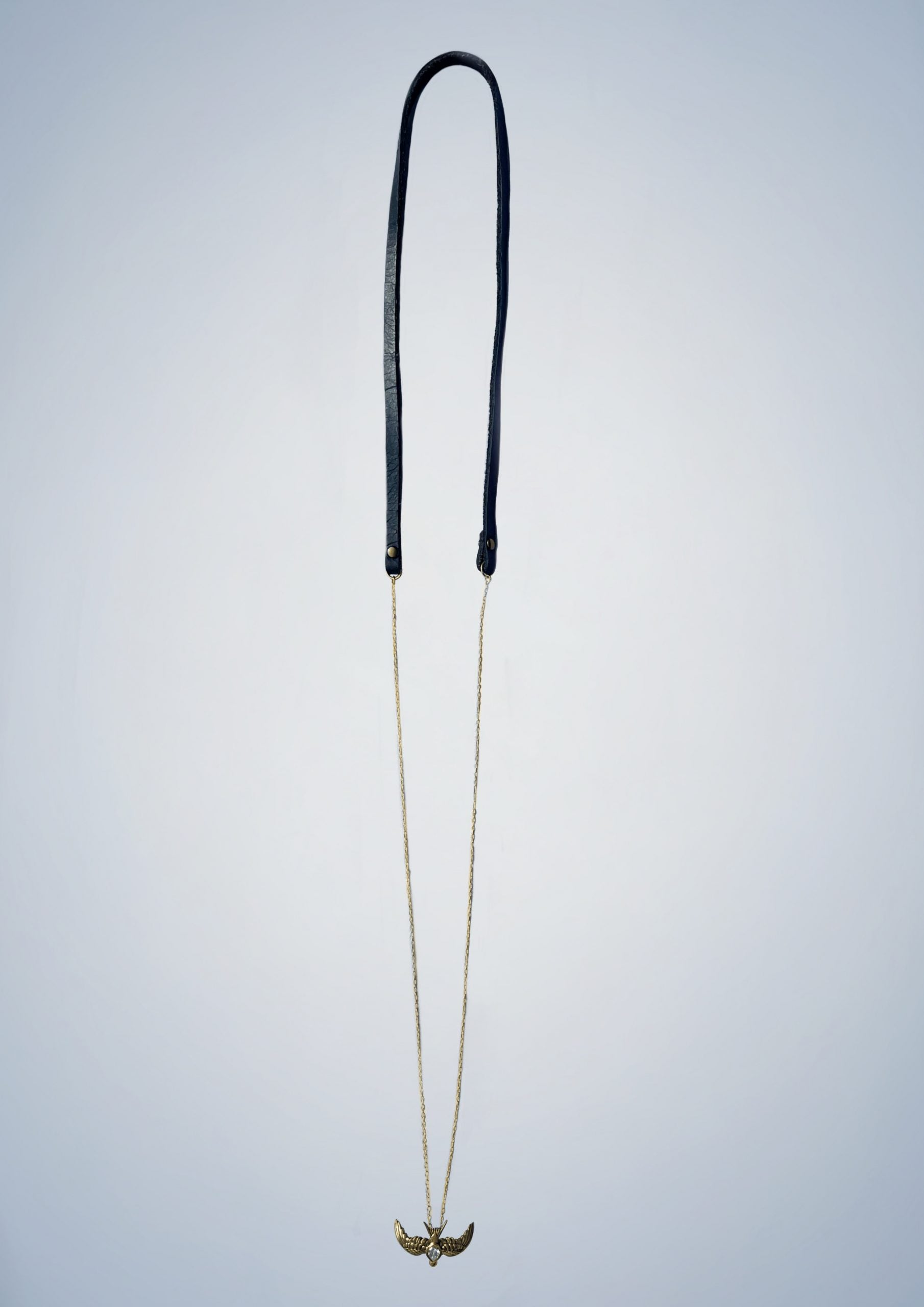 gold swallow pendant, leather strap, ultra thin trace chain