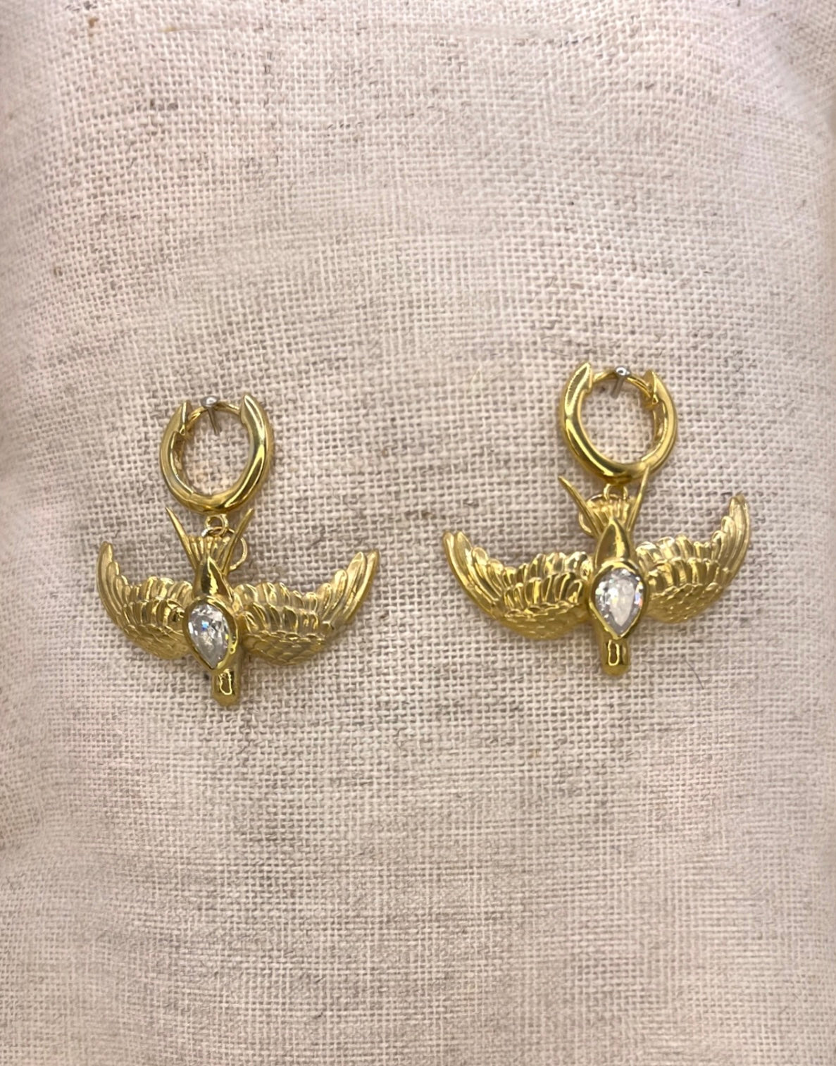 Large gold swallow on clicker hoops