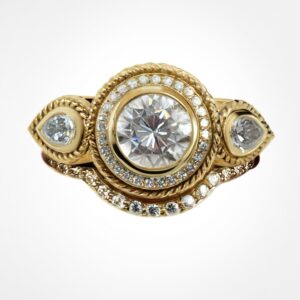 “Total eclipse” diamond ring, & pave wedding band, yellow gold