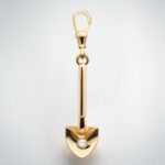 Ibiza gold digger charm - gold spade pendant on white background, available in silver, gold vermeil, or solid gold with raw diamond